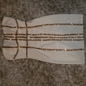 White with gold sequin dress